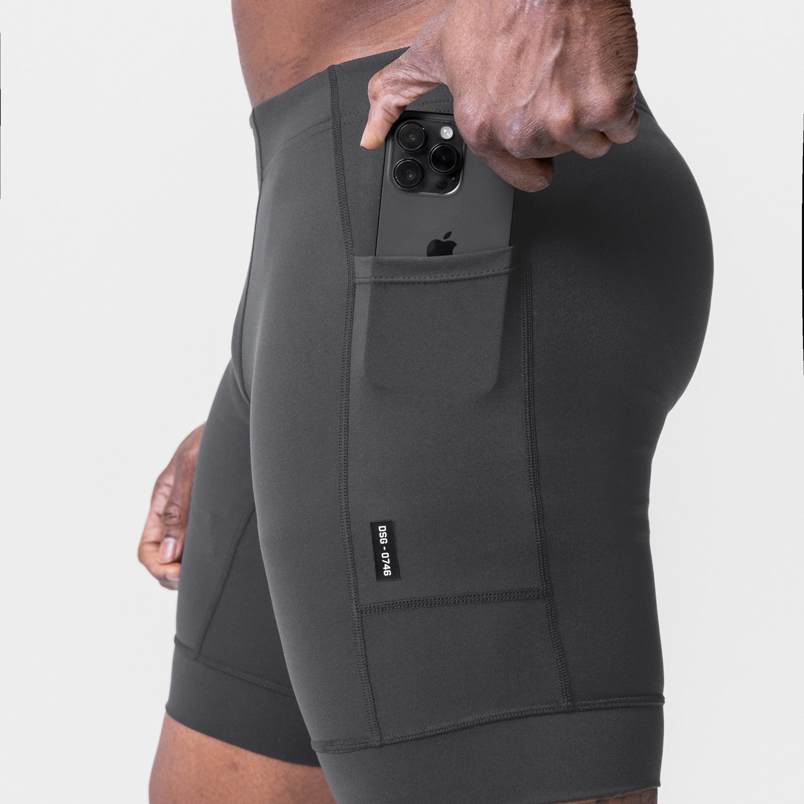 WarpFlexx® Side Pocket 1/2-Length Legging in Space Grey, model holding phone in side pocket