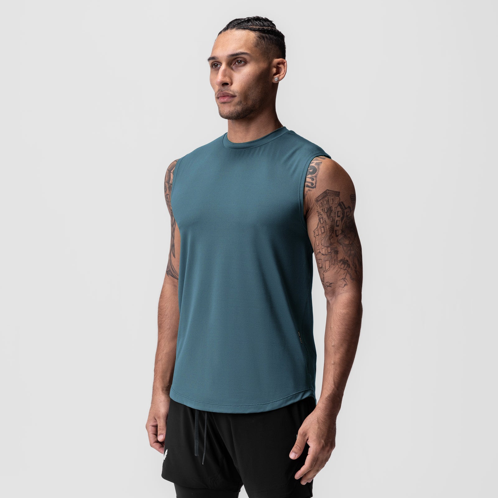 AeroSilver Cutoff Tank in storm blue, worn by male model, front view