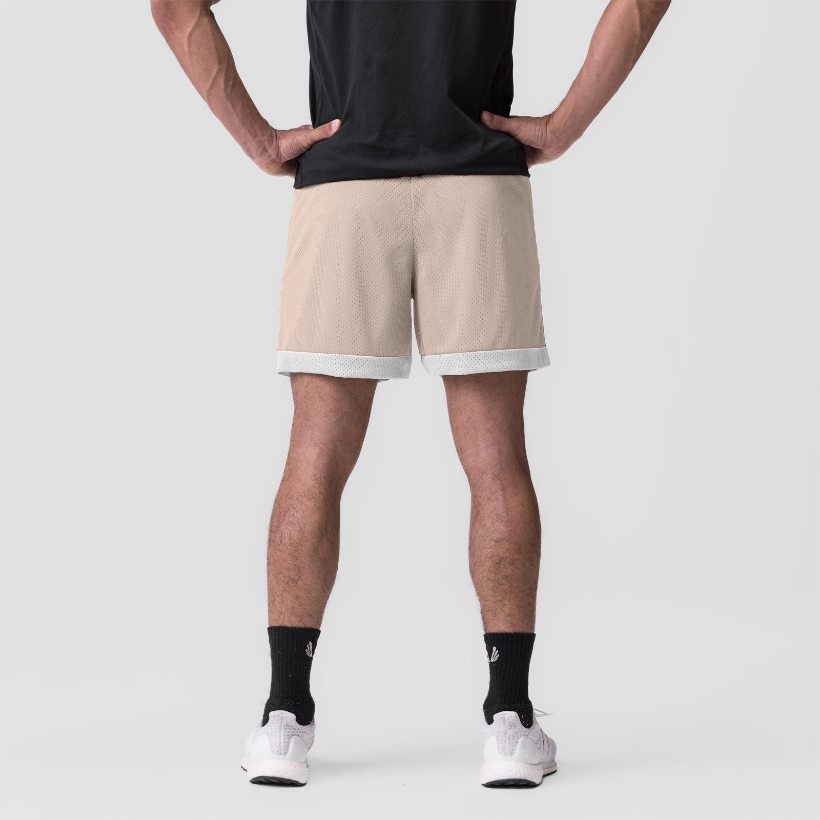 SilverPlus™ Mesh Reversible Short in beige/white, back view on model