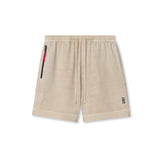 0782. Tech Essential™ Sweat Short - Faded Beige