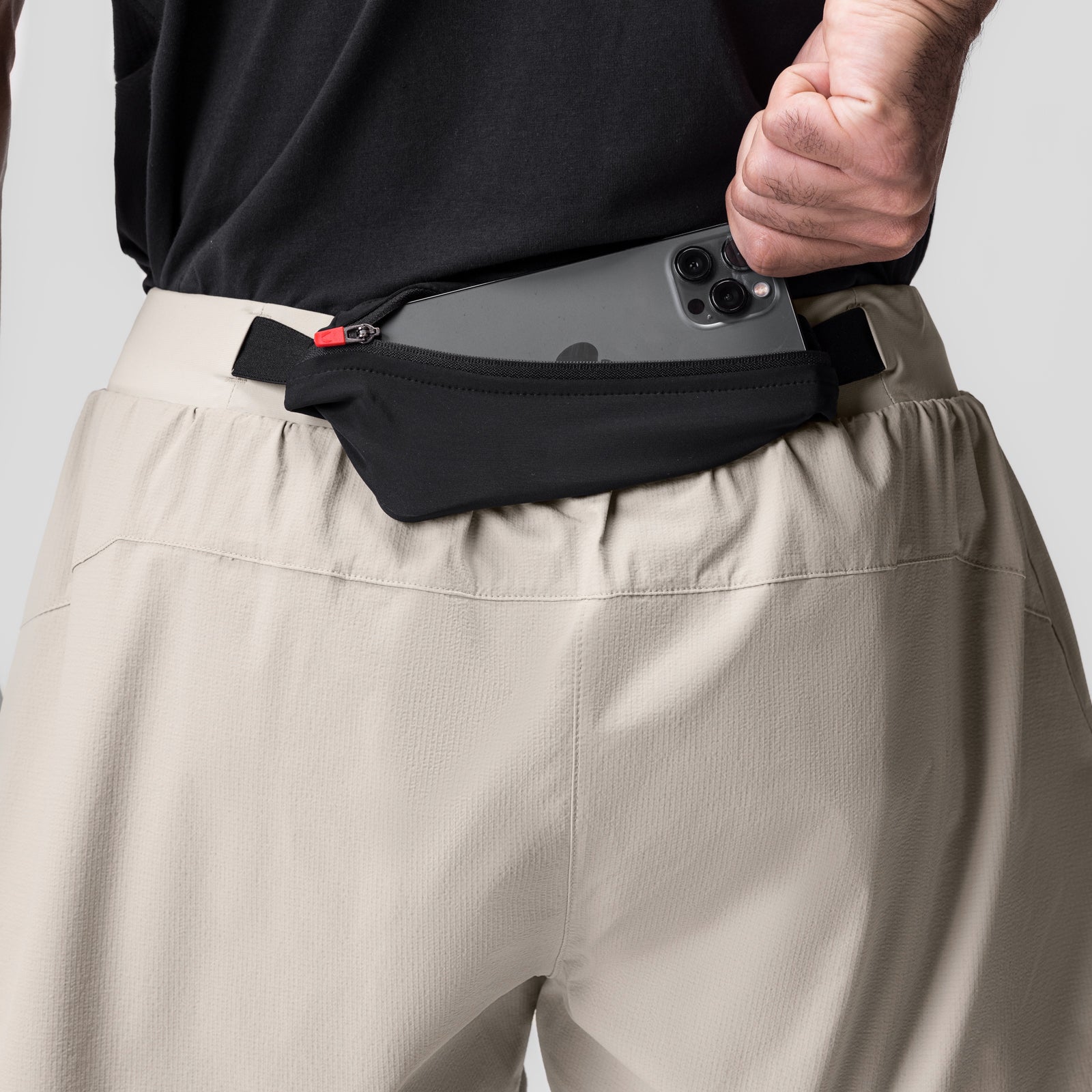 Ripstop 3" Belt Pack Short in beige worn on model with black belt pack, front view