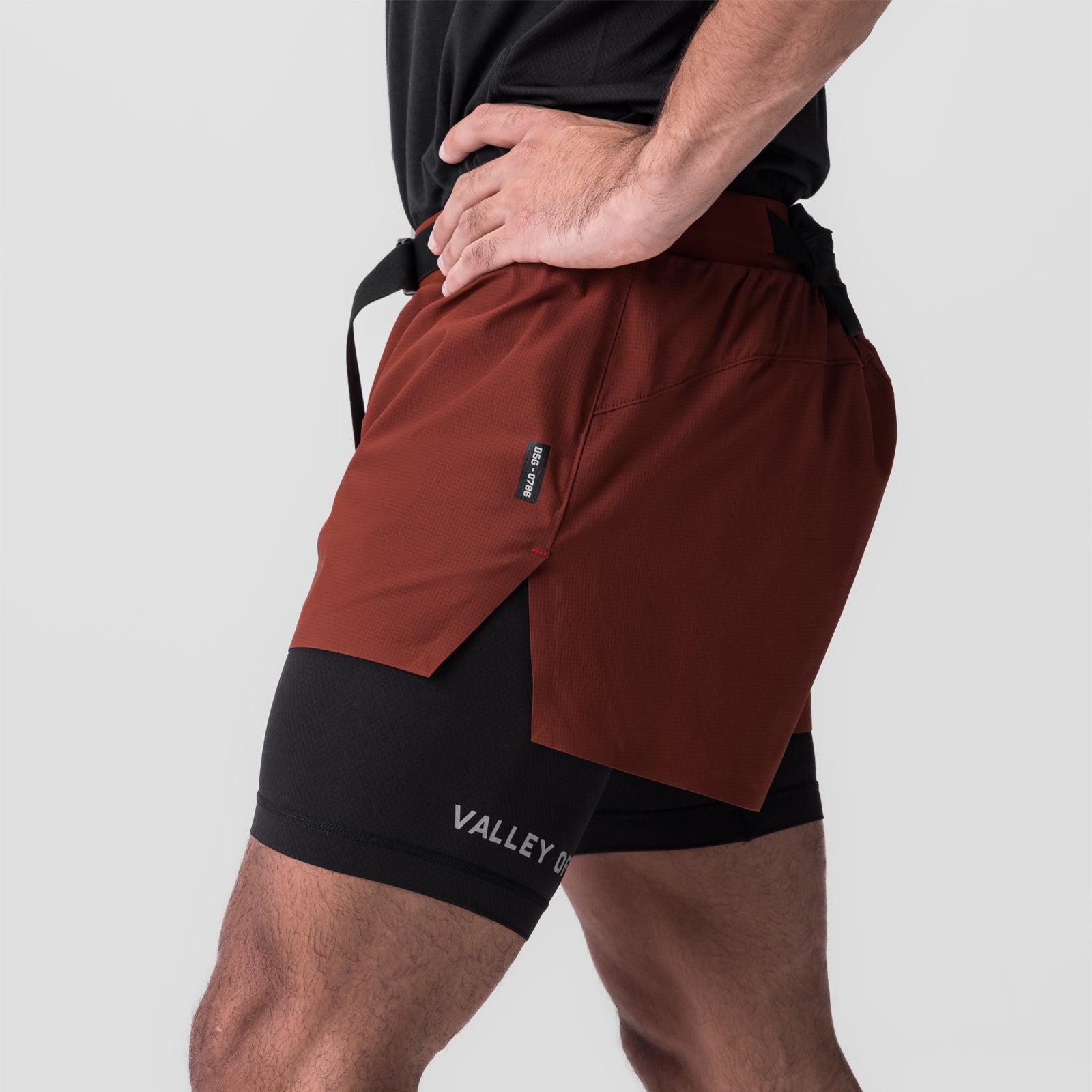 Ripstop 3" Belt Pack Short in brick red and black, worn by model, side view
