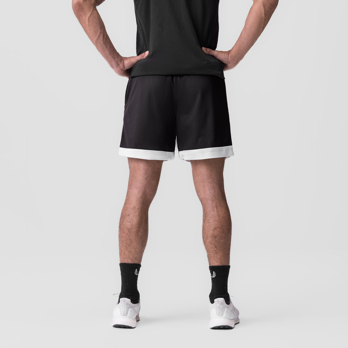 SilverPlus Mesh Reversible Shorts in Black/White, back view on model