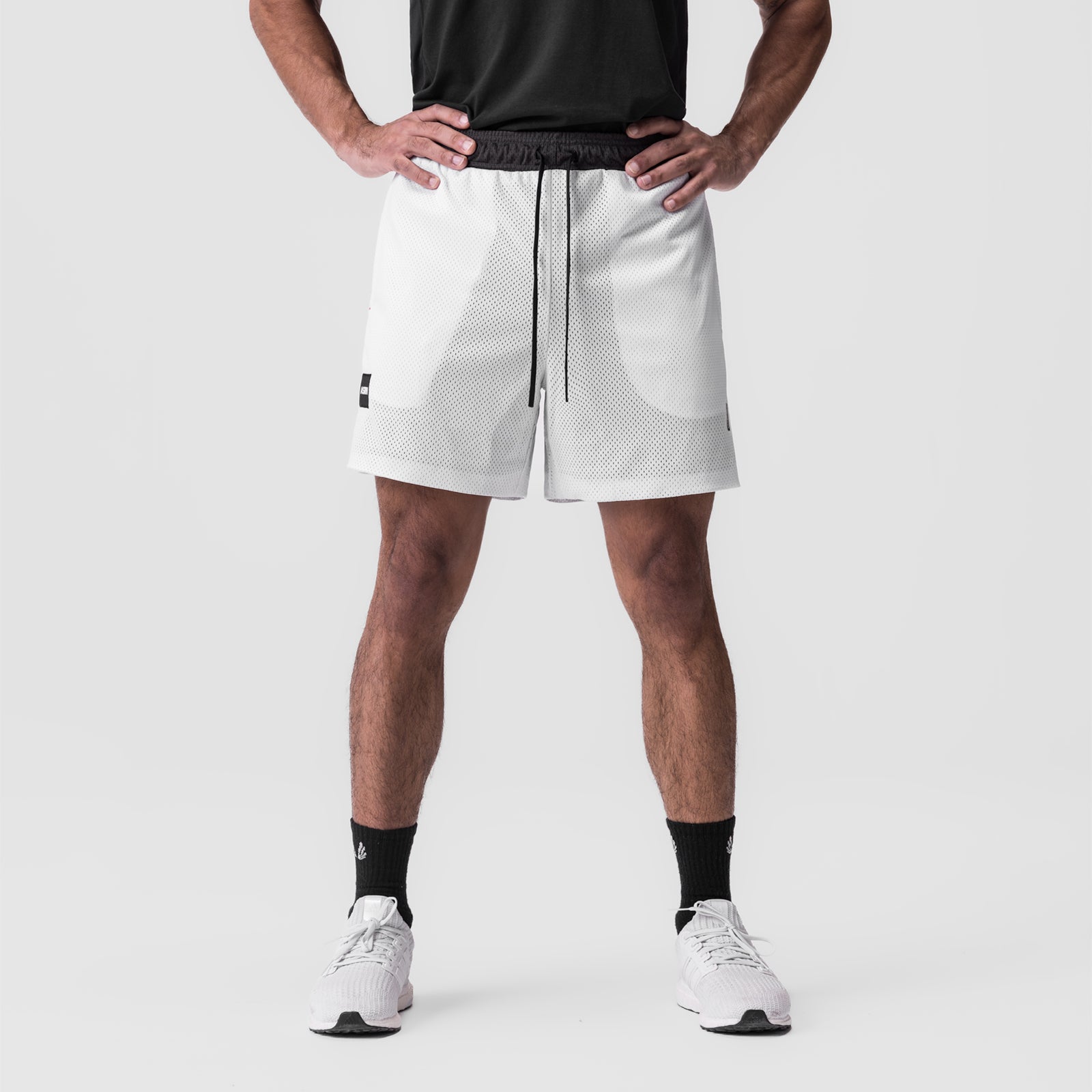 SilverPlus™ Mesh Reversible Short in white, front view on model