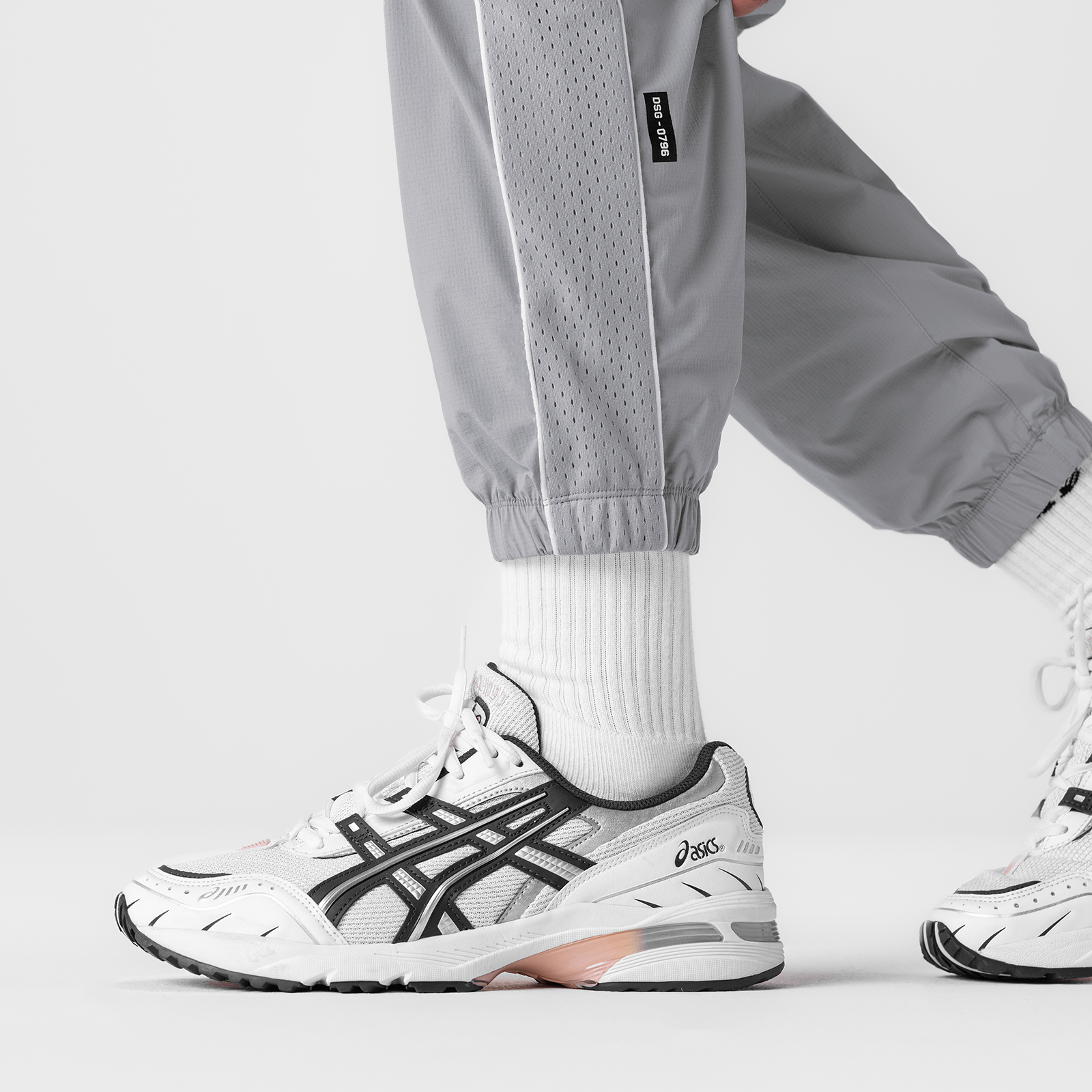 Ripstop Oversized Track Pant in slate grey worn with white socks and sneakers, lower body detail shot