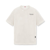 0797. Tech Essential™ Relaxed Tee - Stone "Brush Wings/ASRV"