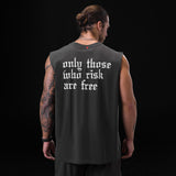 Tech Essential Relaxed Cutoff tank top in space grey, worn by model showing back with white text graphic