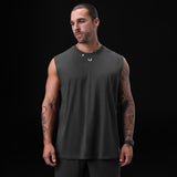 Tech Essential Relaxed Cutoff sleeveless tank in space grey, worn by model, front view