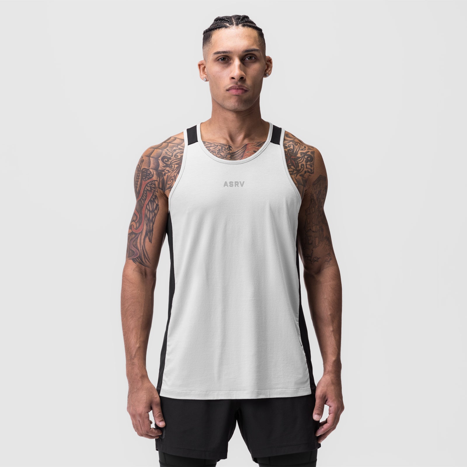 White Supima® Mesh Panel Training Singlet with black side panels, worn by model, front view