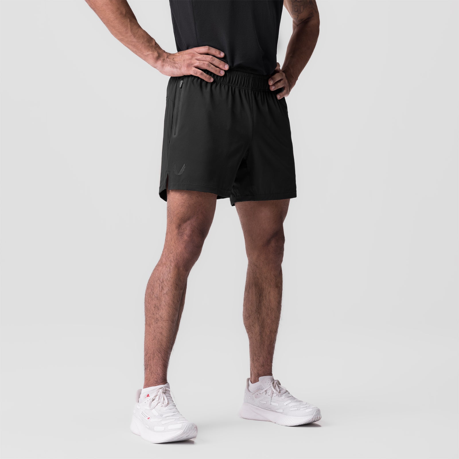 Ultralite 6" Linerless Short in Dusk Black, worn by model standing against white background