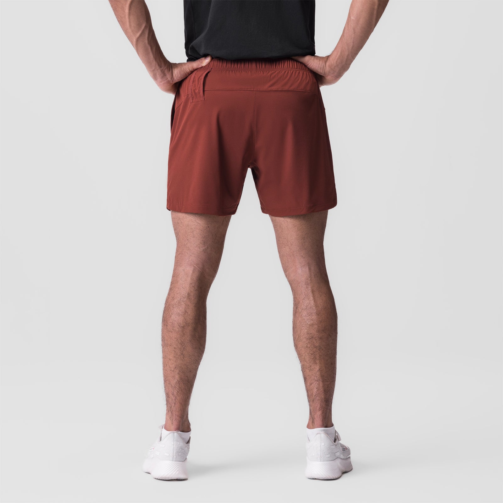 Ultralite 6" Linerless Short in brick, back view on model