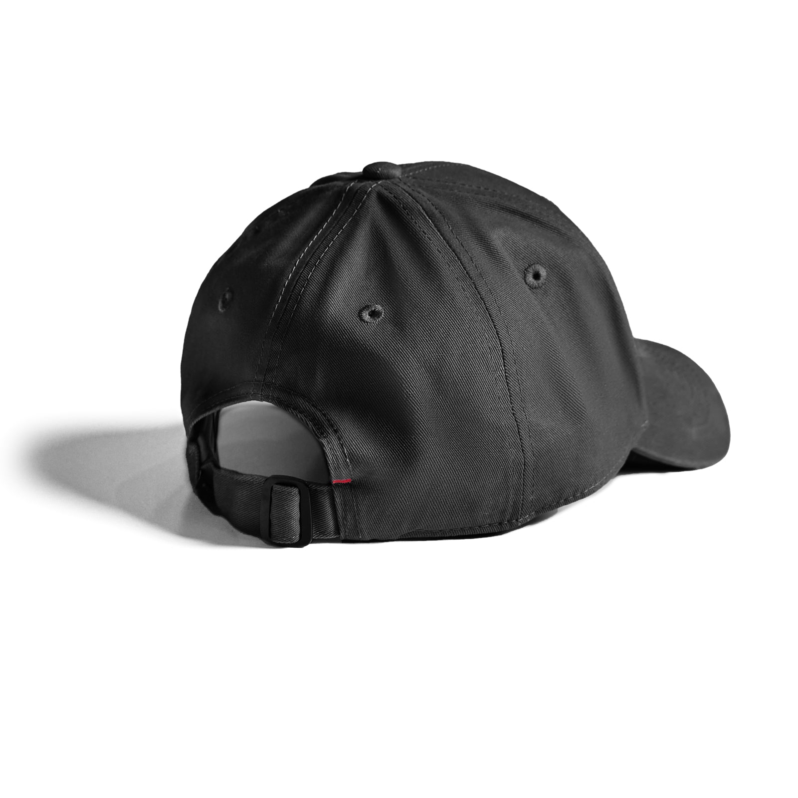 Black Sport Cap with back strap closure, displayed at an angle on white background