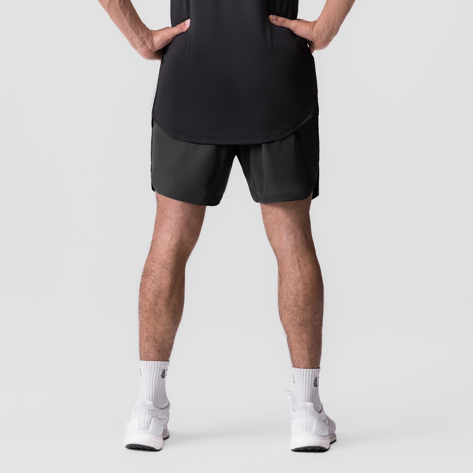 Tetra-Lite 7" Linerless Short in black, worn by model, front view