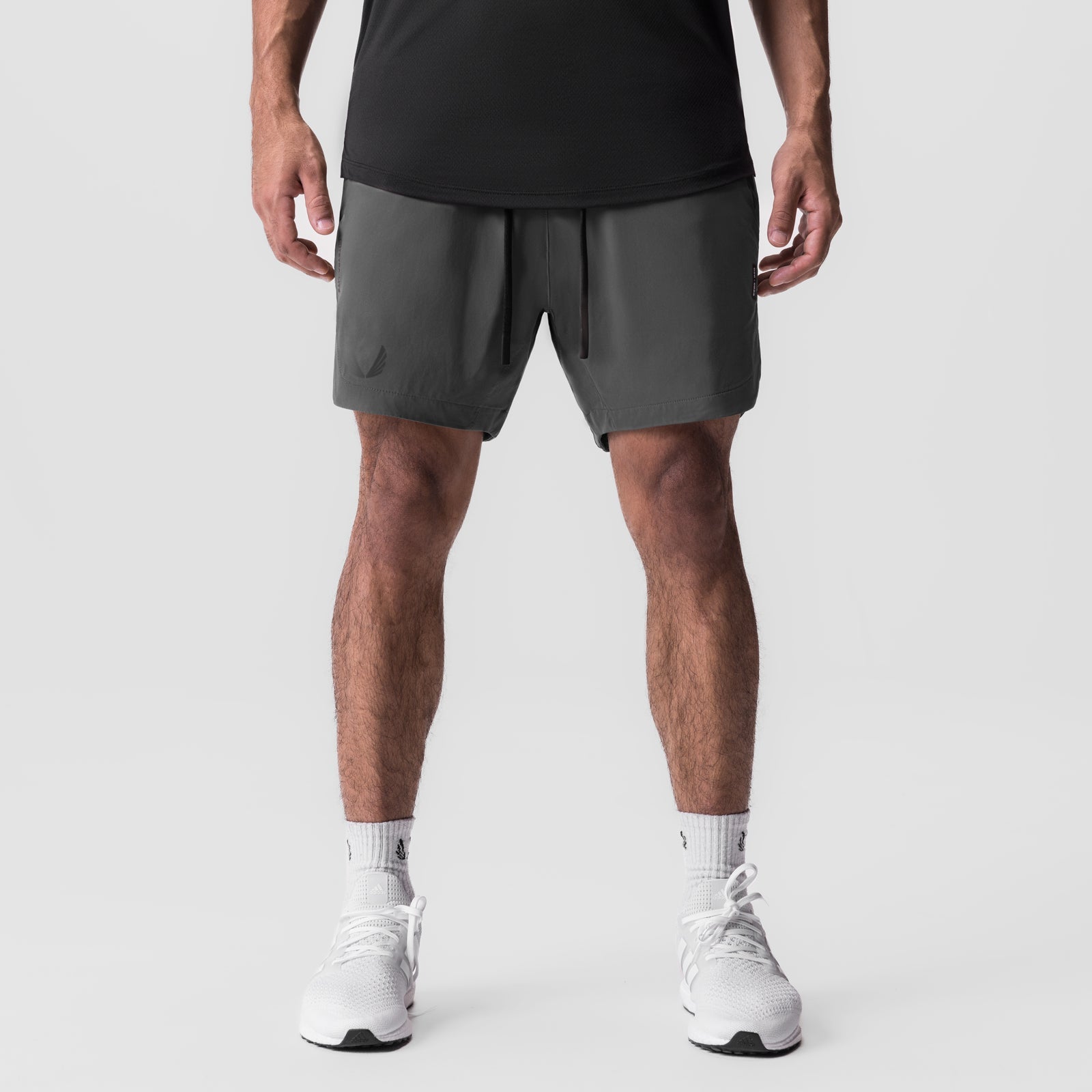 Tetra-Lite 7" Linerless Short in Space Grey worn by model, front view