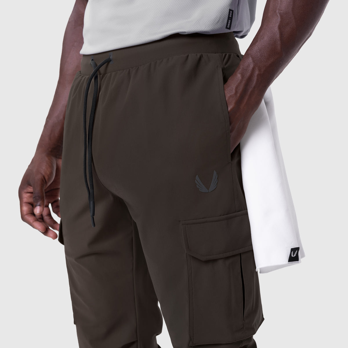 Tetra-Lite® Cargo High Rib Jogger in Dark Earth, side view on model
