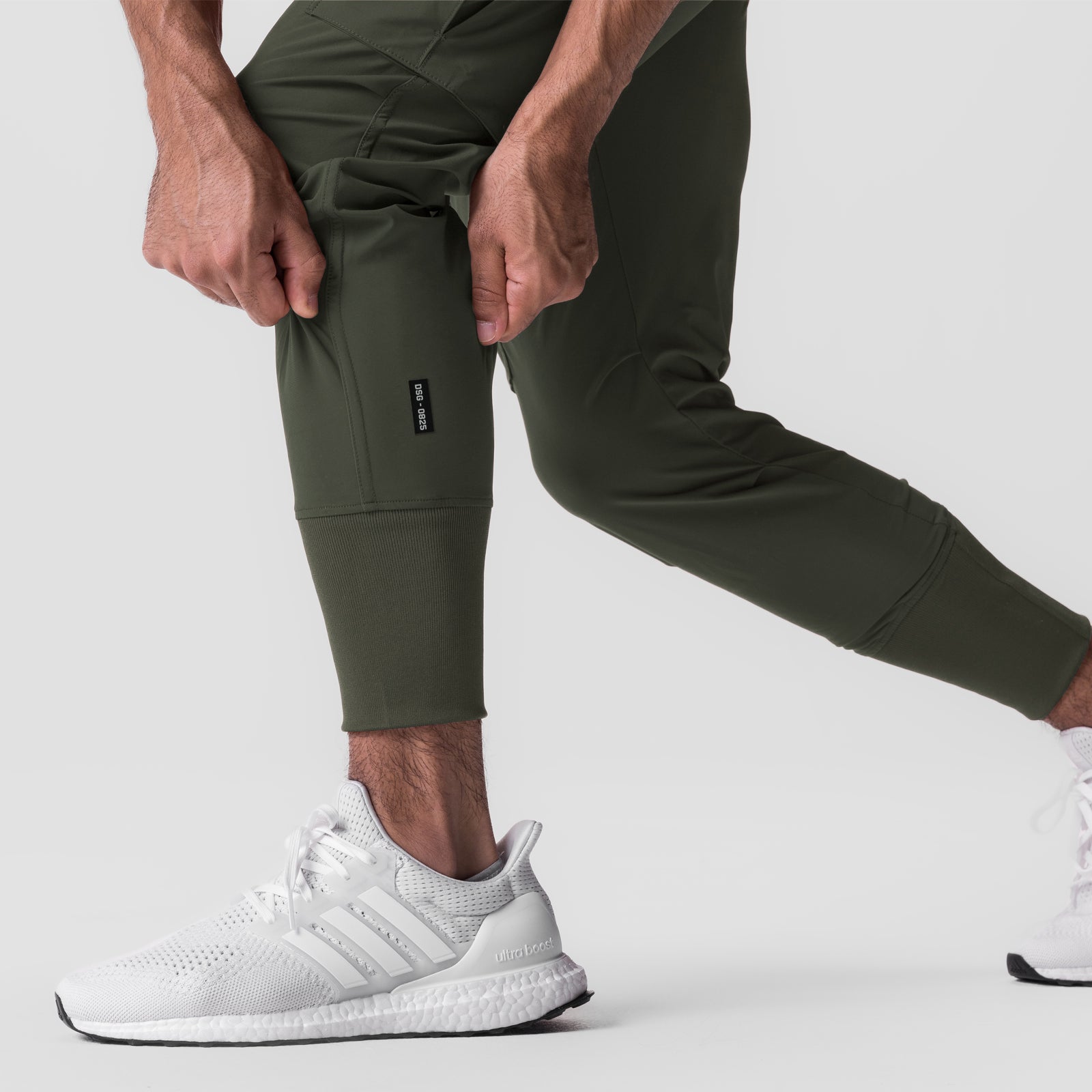 Tetra-Lite Cargo High Rib Jogger in olive worn by model, front view