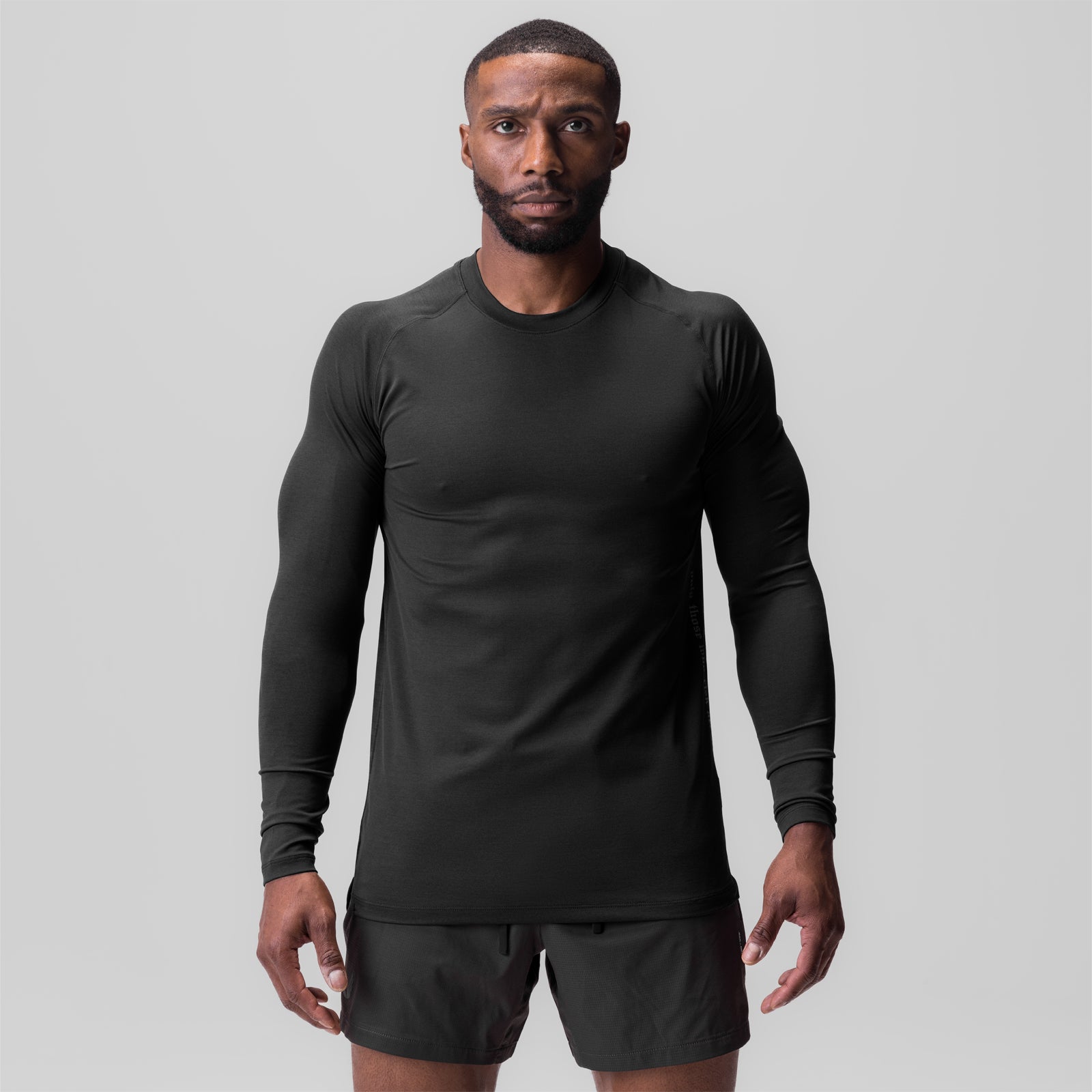3D-Lite® 2.0 Fitted Long Sleeve in black, worn by male model standing against grey background