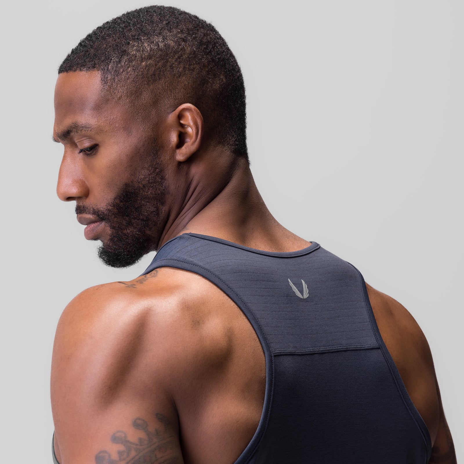 3D-Lite® 2.0 Training Singlet in navy, worn by model in profile view