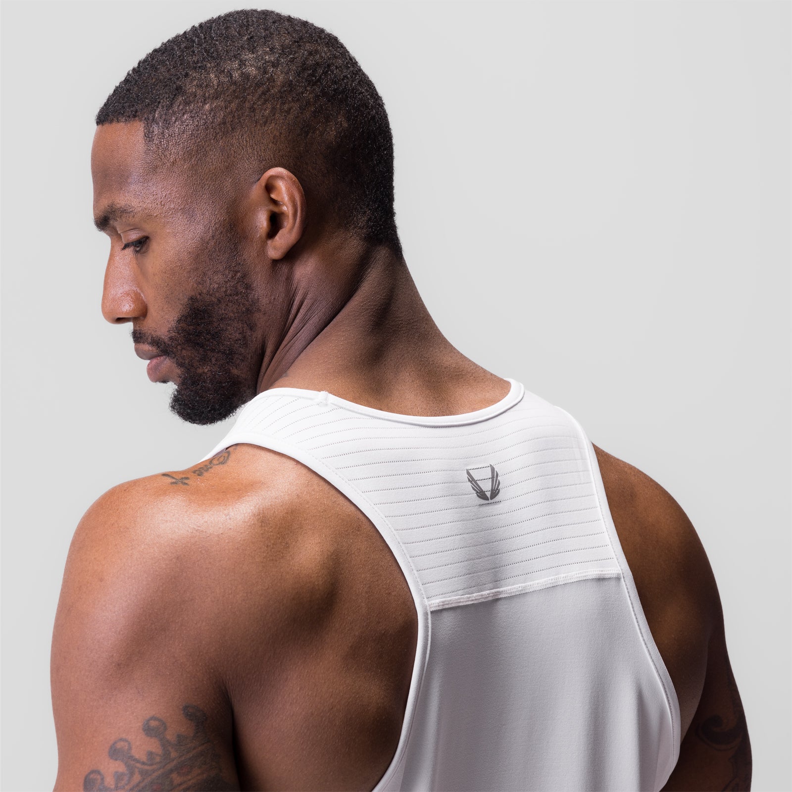 White 0834 3D-Lite 2.0 Training Singlet worn by model, side profile view
