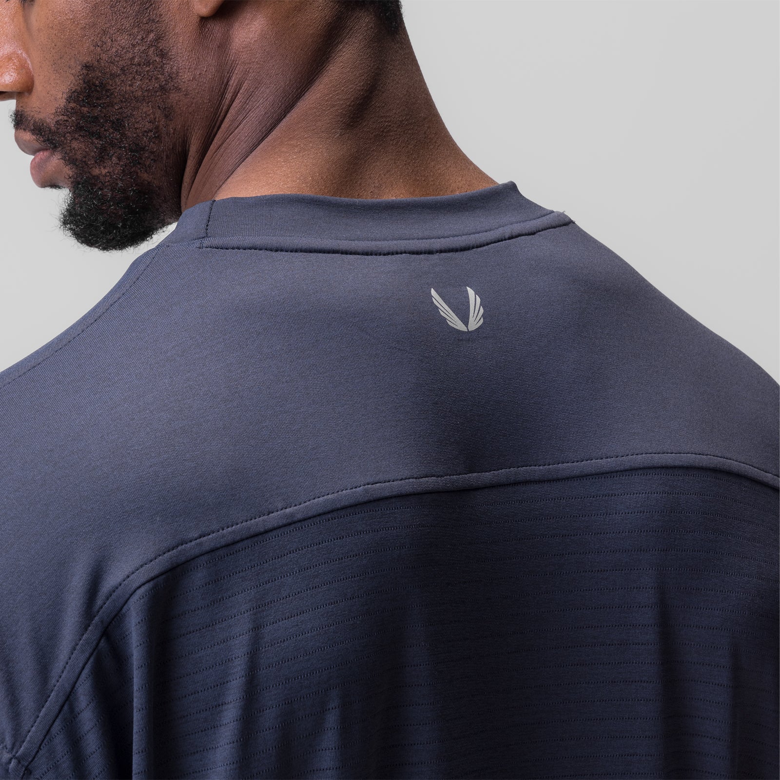 3D-Lite® 2.0 3/4-Sleeve Oversized Tee in navy, rear view on model