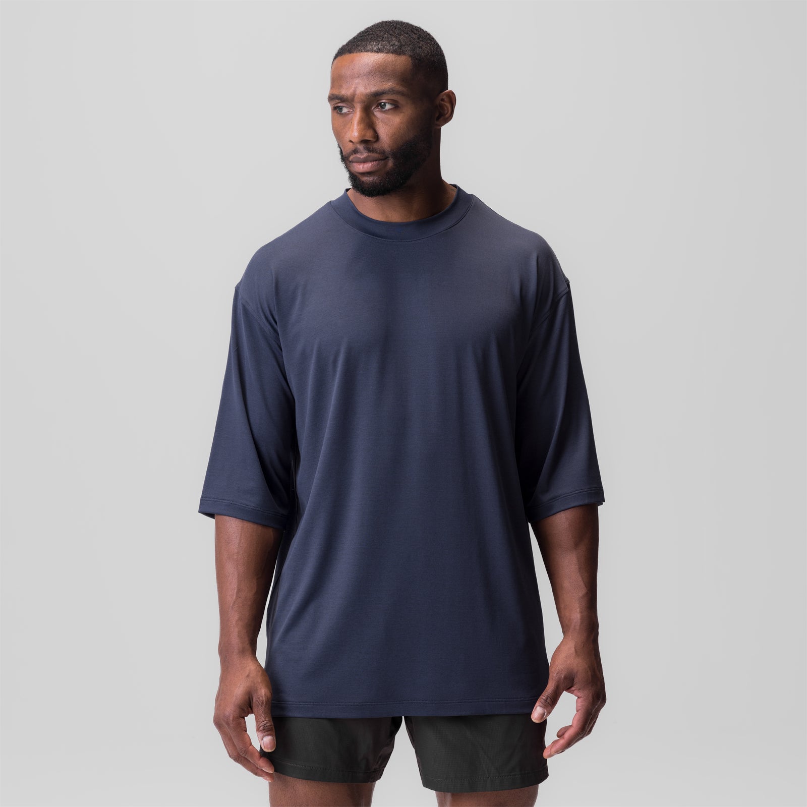 Navy 3D-Lite® 2.0 3/4-sleeve oversized tee worn by model, front view