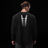 0851. Tech Essential™ Relaxed Long Sleeve - Black "Brush Stroke"