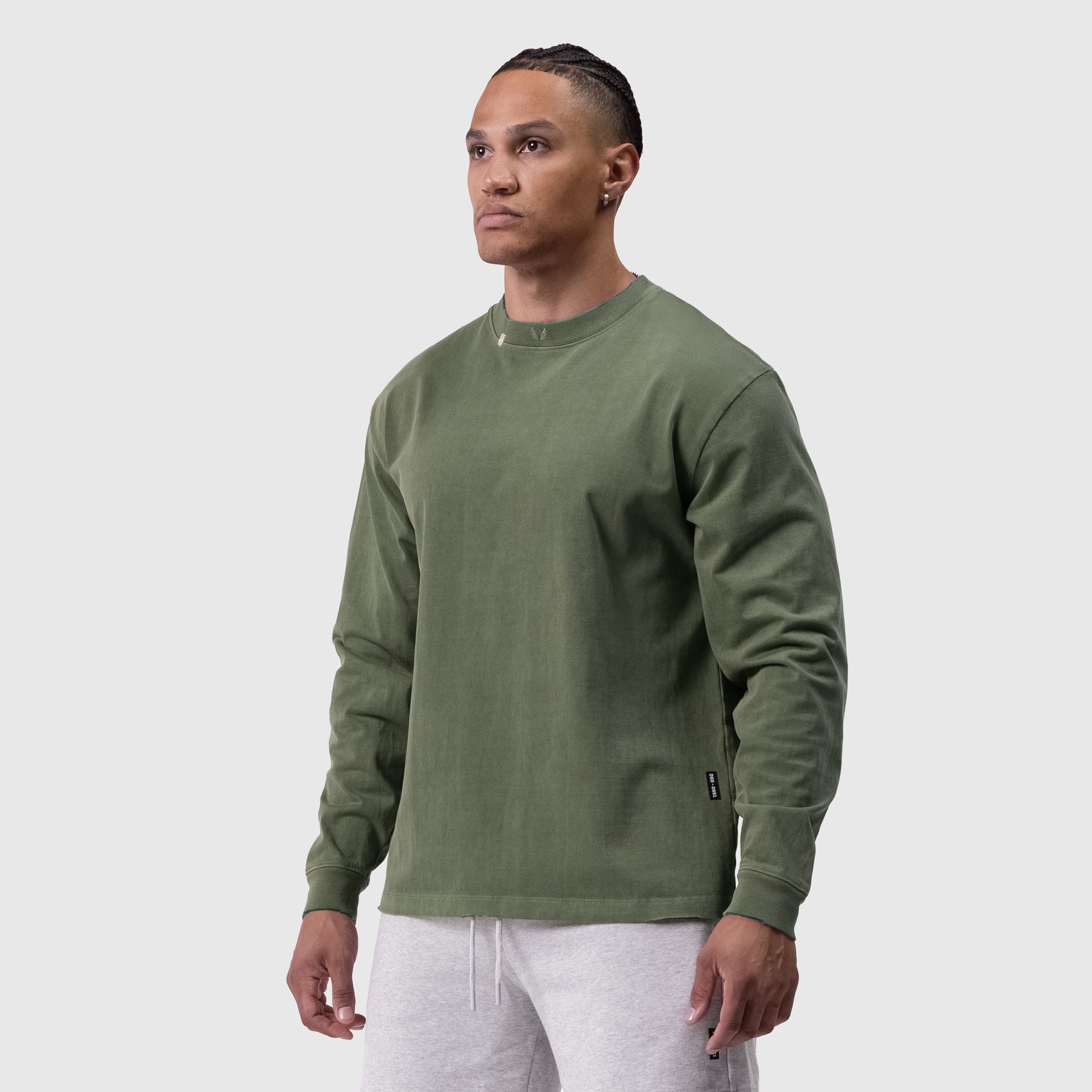 Tech Essential Relaxed Long Sleeve in Faded Olive, worn by model, front view