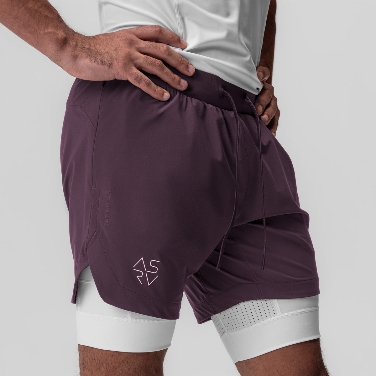 Tetra-Lite 7" Liner Short in deep purple and white, worn by model, side view