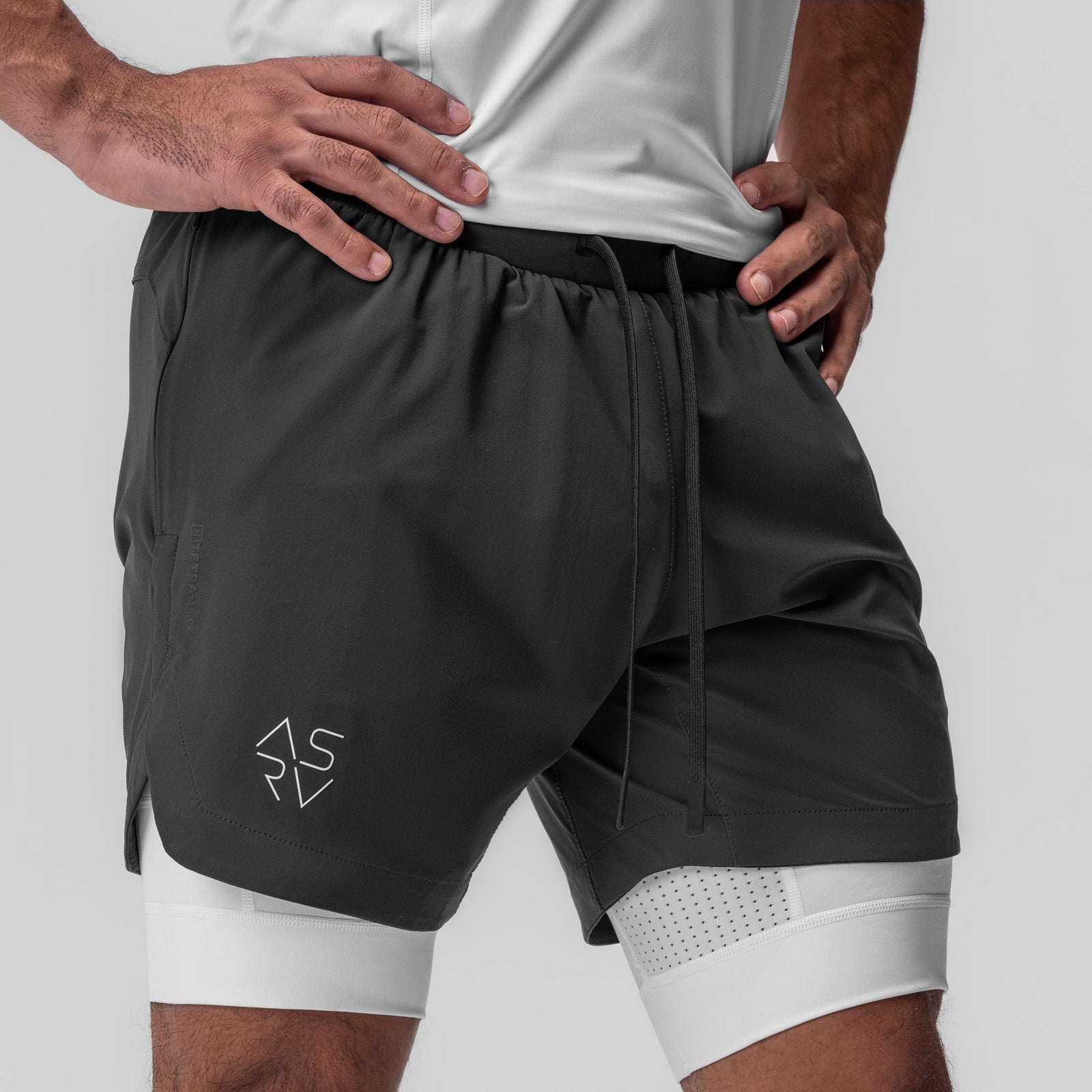 Tetra-Lite 7" Liner Short in Space Grey and White, worn by model, front view