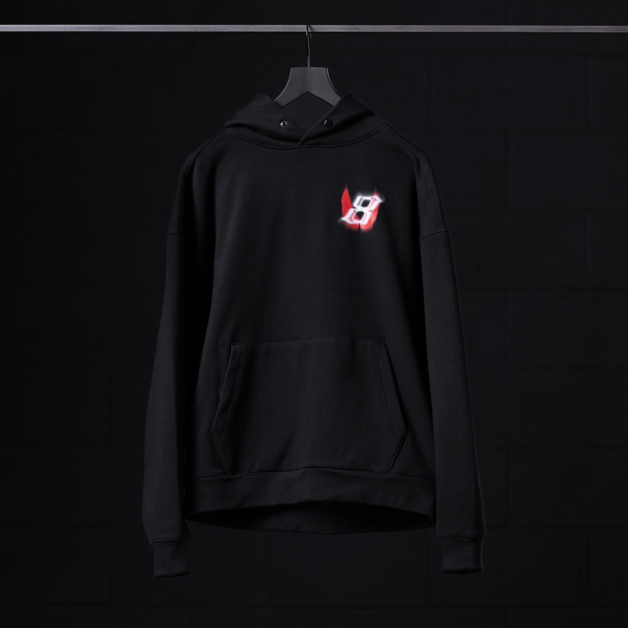 Flatlay Tech-Terry™ Zip Pocket Hoodie in black with glowing logo, front view