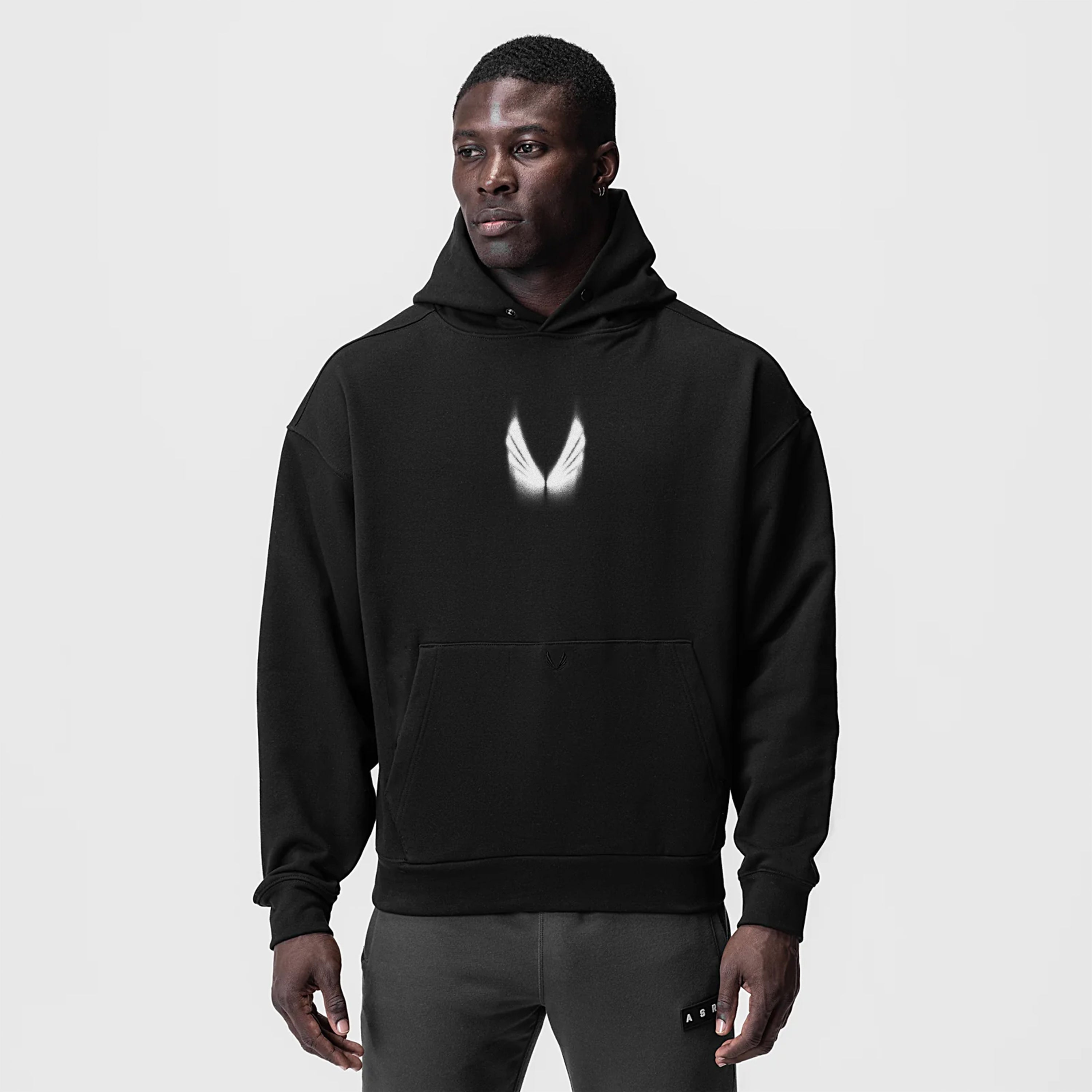 Tech-Terry Zip Pocket Hoodie in black with motion blur graphic, worn by model, front view
