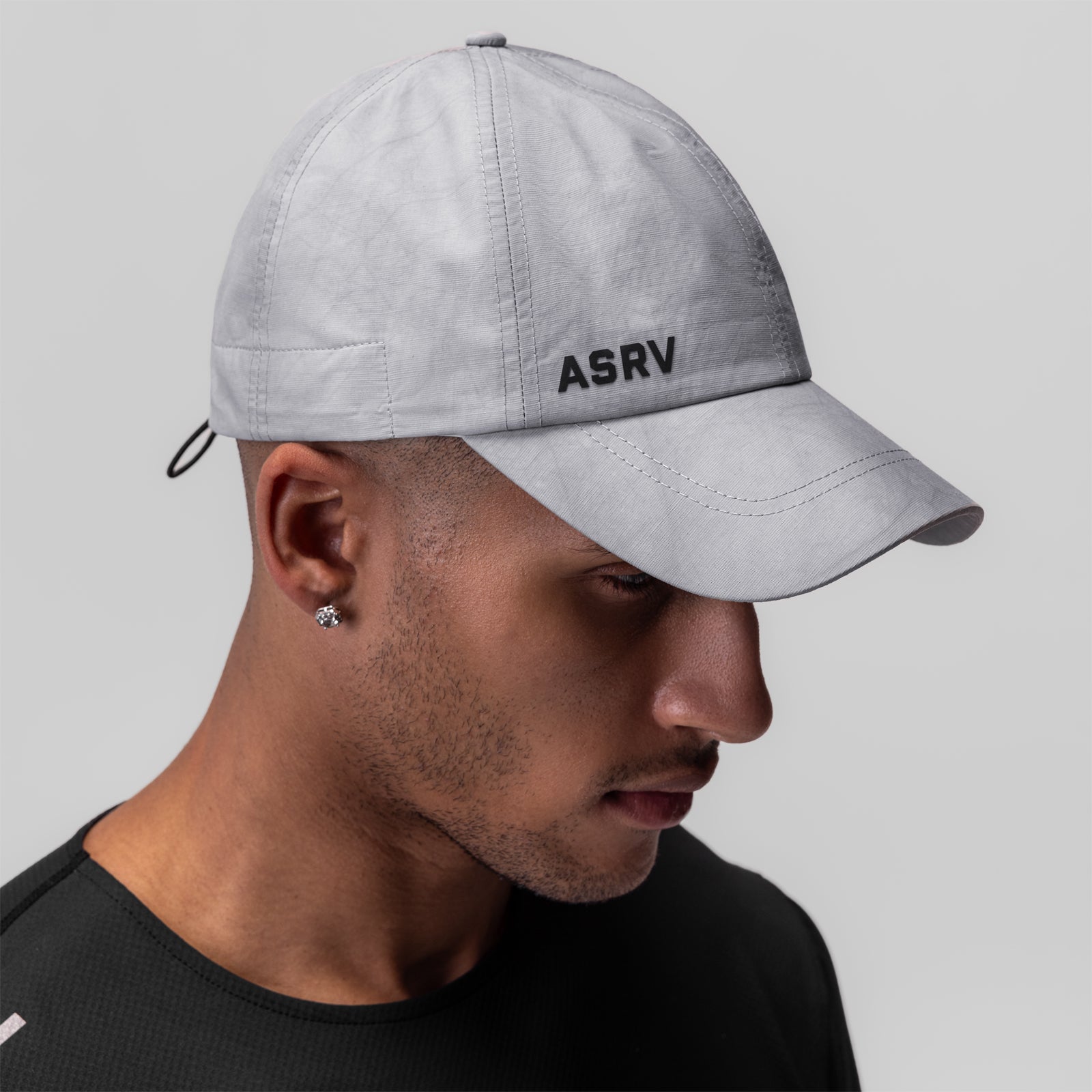 Weather-Ready Cinch Hat in grey worn by model, side profile view
