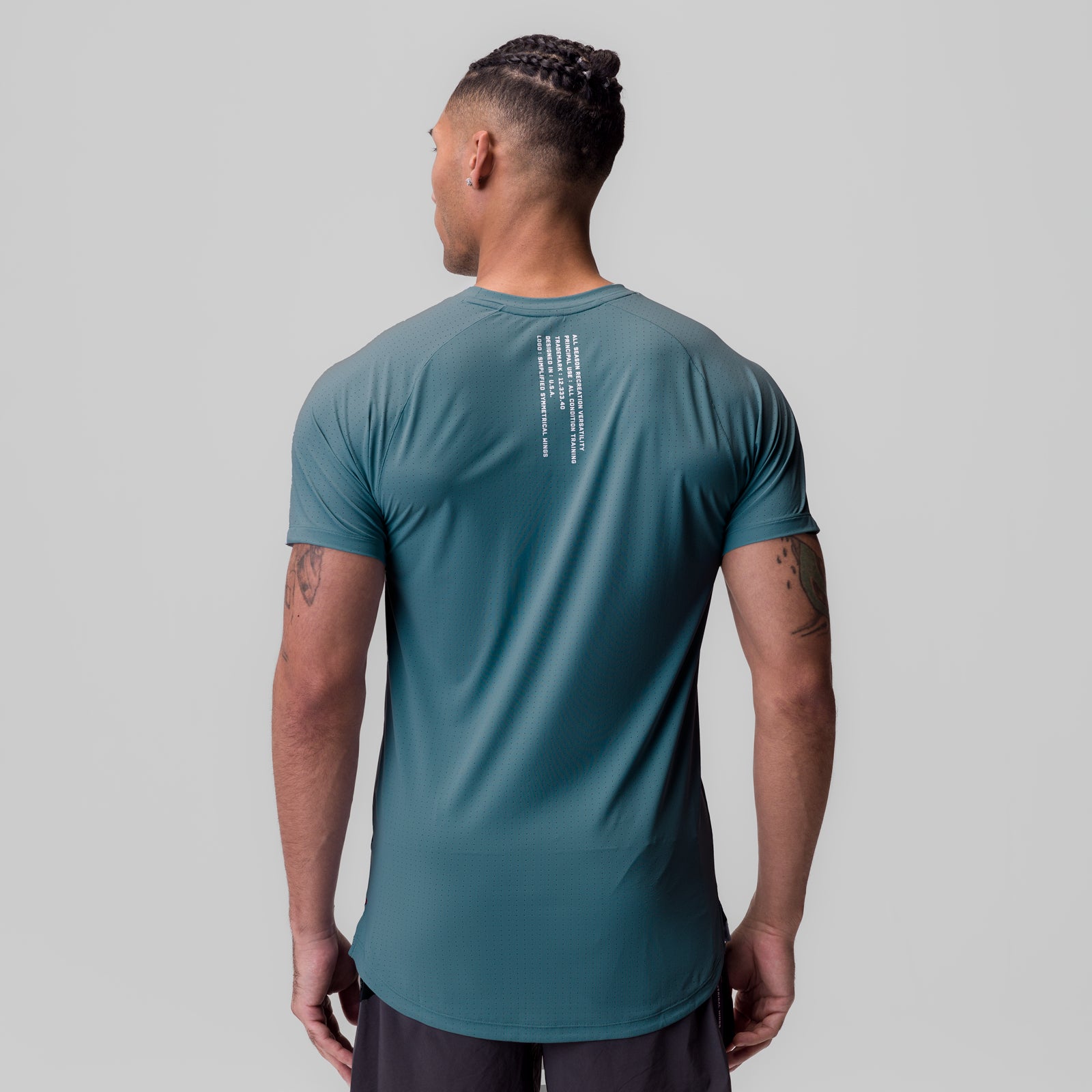 Laser-Vent Established Tee in storm blue, back view on model