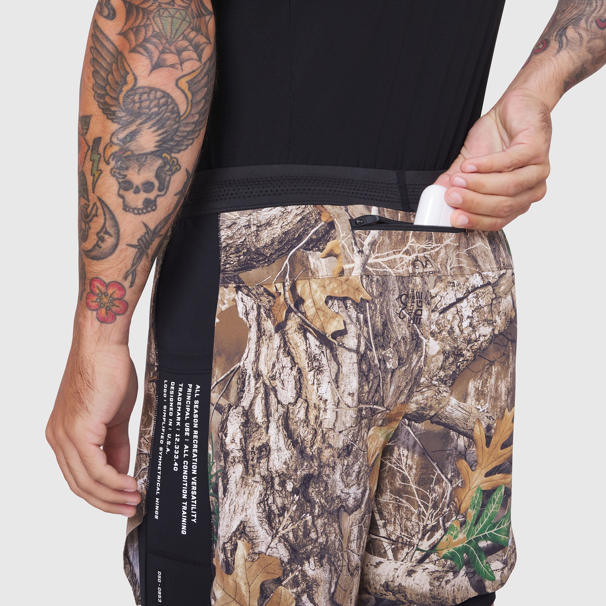 Aerotex Hybrid Liner Short in Realtree Edge camo, worn by model showing side detail