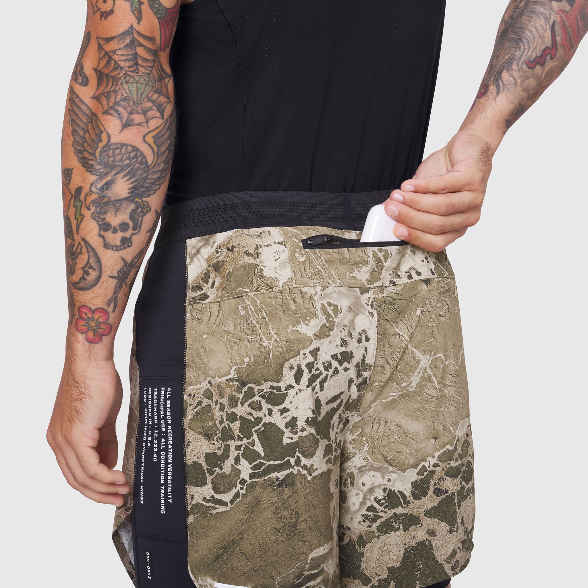 Aerotex Hybrid Liner Short in camo print, worn by model showing side view and details