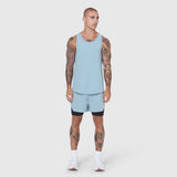 Laser-Vent Tank Top in light sky worn with matching shorts, front view on model