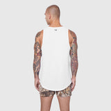 White Laser-Vent Tank Top worn by model, back view, with camouflage shorts