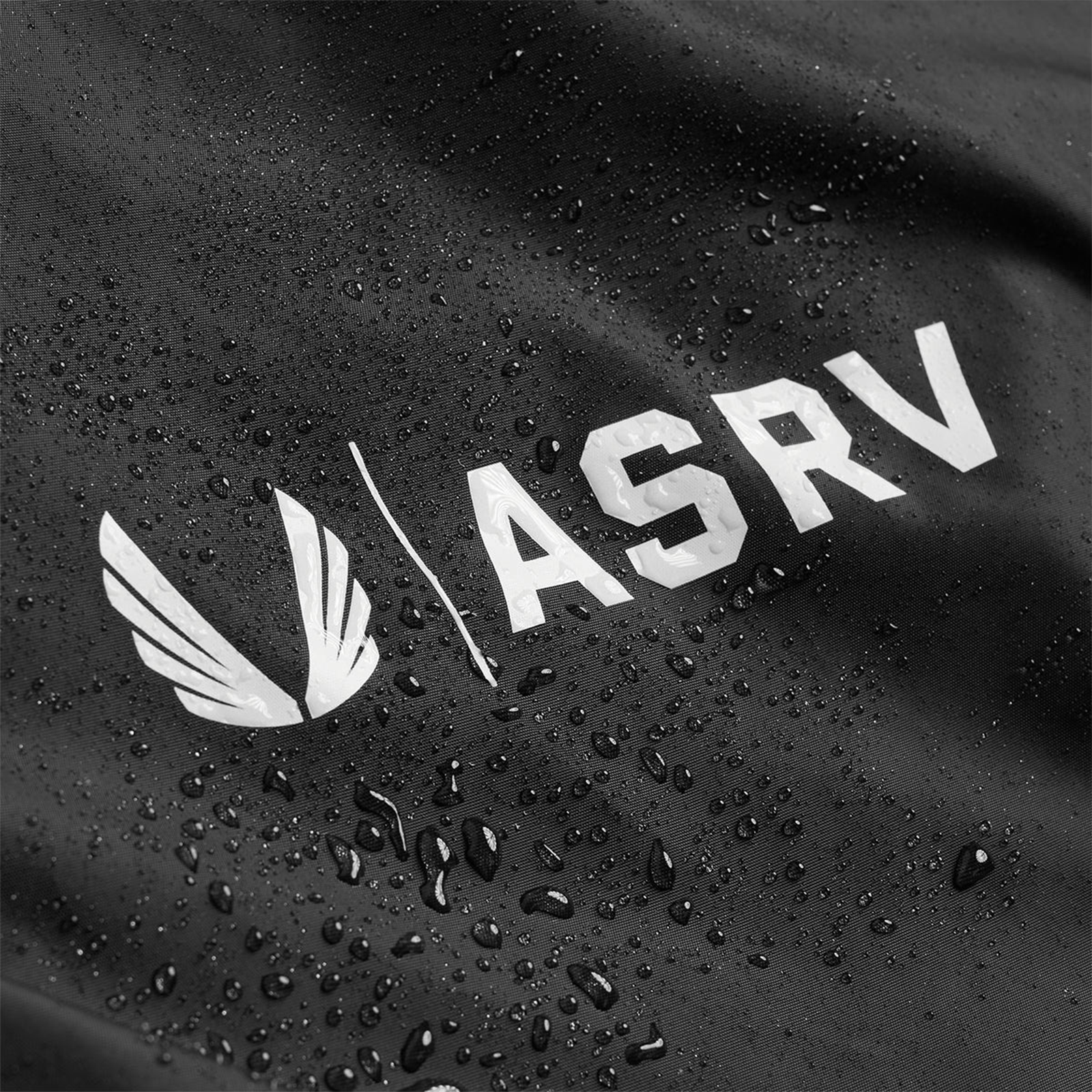 Flatlay Waterproof Drawstring Rec Bag in black, top view with water droplets