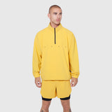Aerotex Quarter-Zip Jacket in amber yellow worn by model, front view