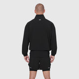 Aerotex Quarter-Zip Jacket in black, worn by model from back view