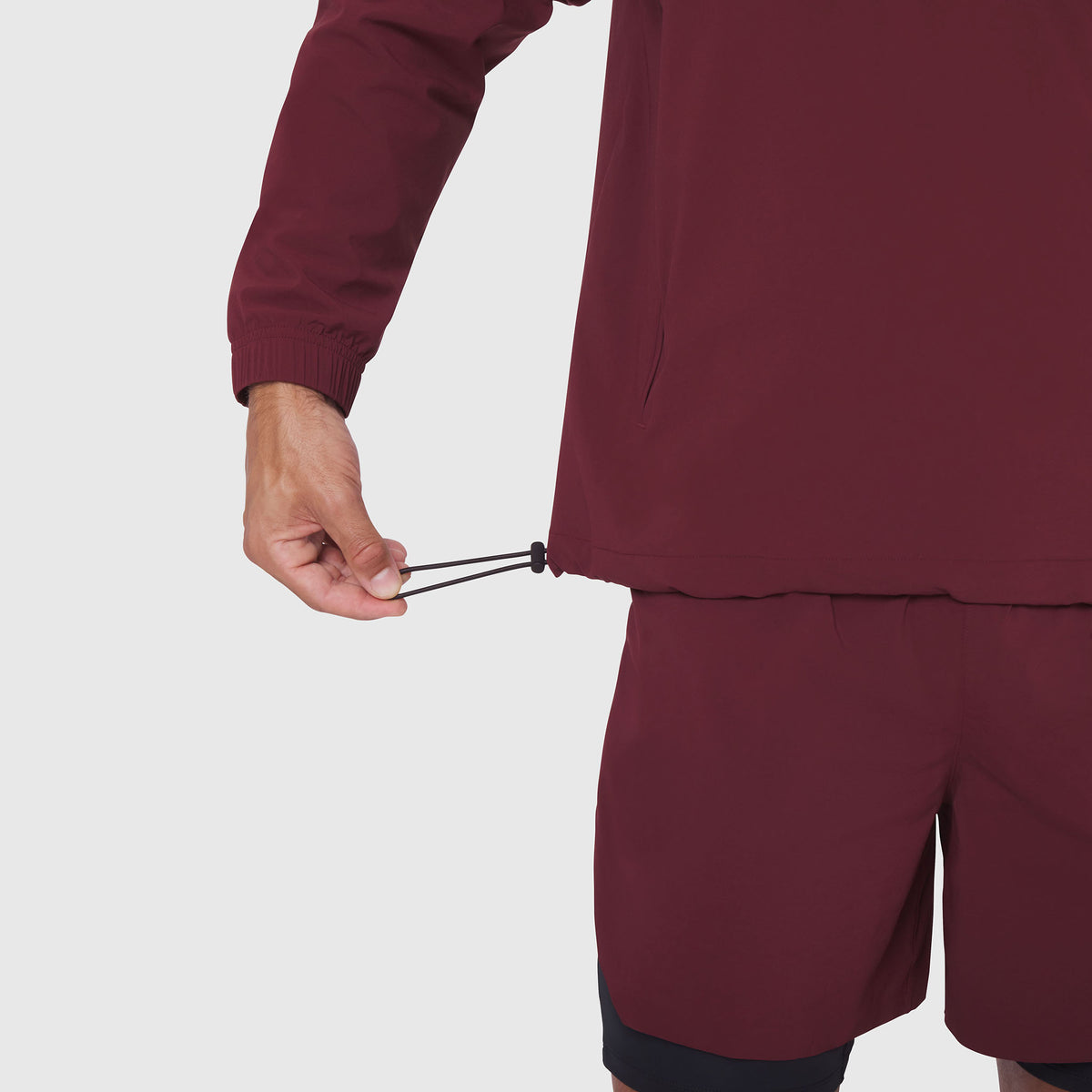 Aerotex Quarter-Zip Jacket in crimson, model wearing jacket with drawstring detail