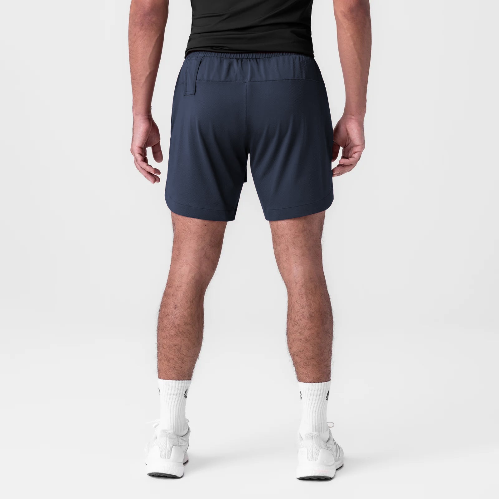 AeroSilver 7" linerless shorts in navy, rear view on model