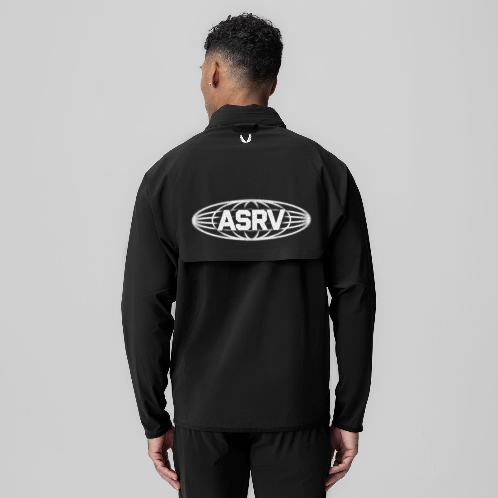 Black Aerotex Weather-Ready Bonded Windbreaker worn by model, back view showing ASRV logo