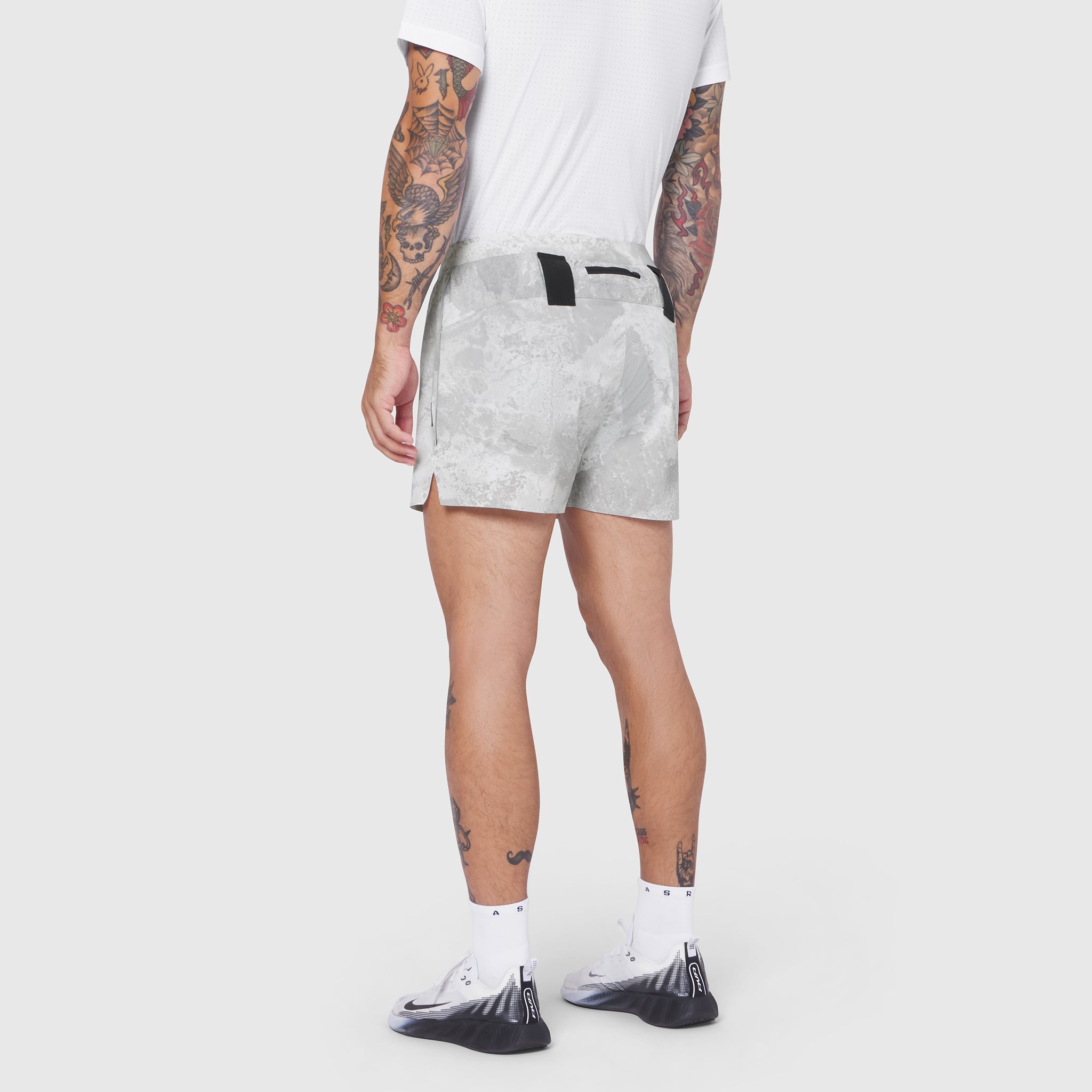 Aerotex Distance Short in light grey camo, worn by model from behind