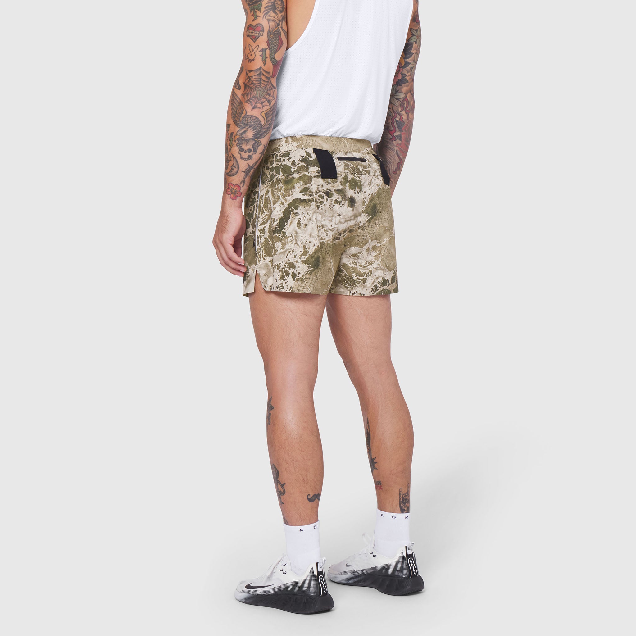Aerotex Distance Short in Realtree WAV3 Blade camo, modeled from side view