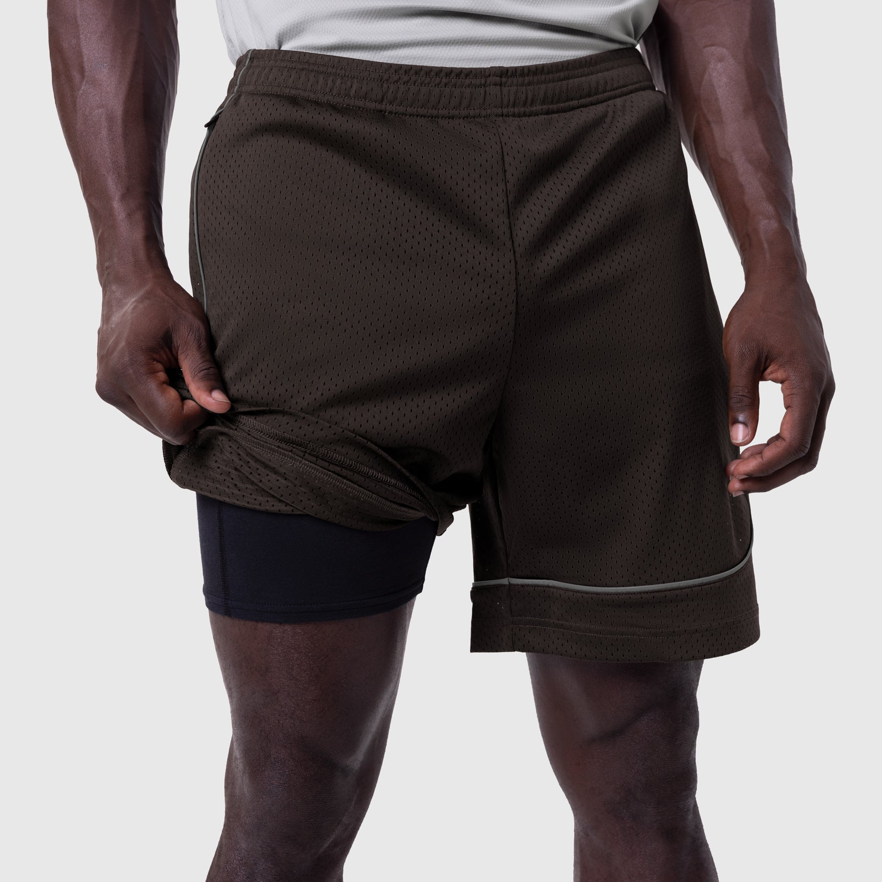 Ion-Mesh™ Modal Liner Short in Dark Earth worn by model, showing mesh construction and built-in liner