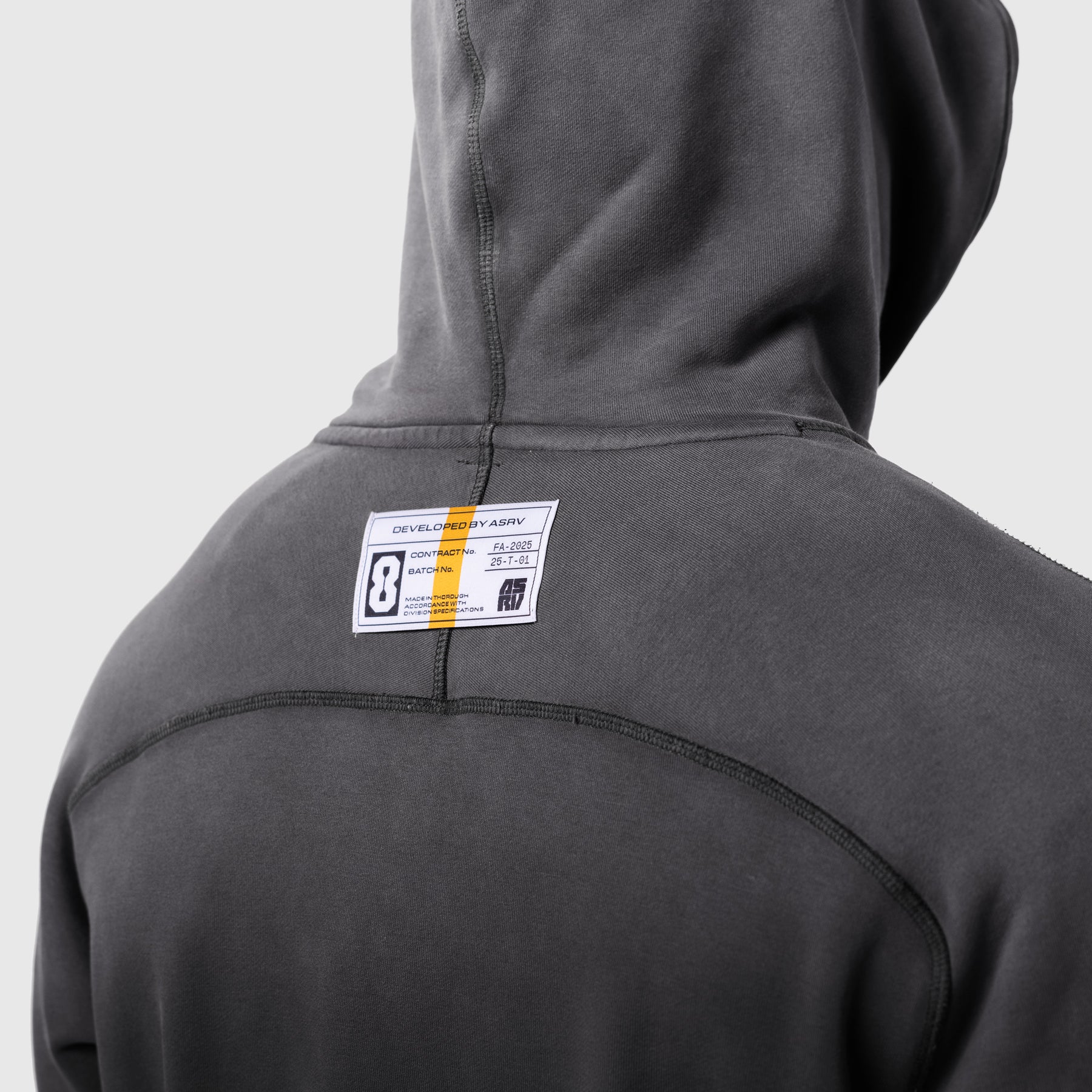 Tech-Terry Training Hoodie in black, back view on model with hood up