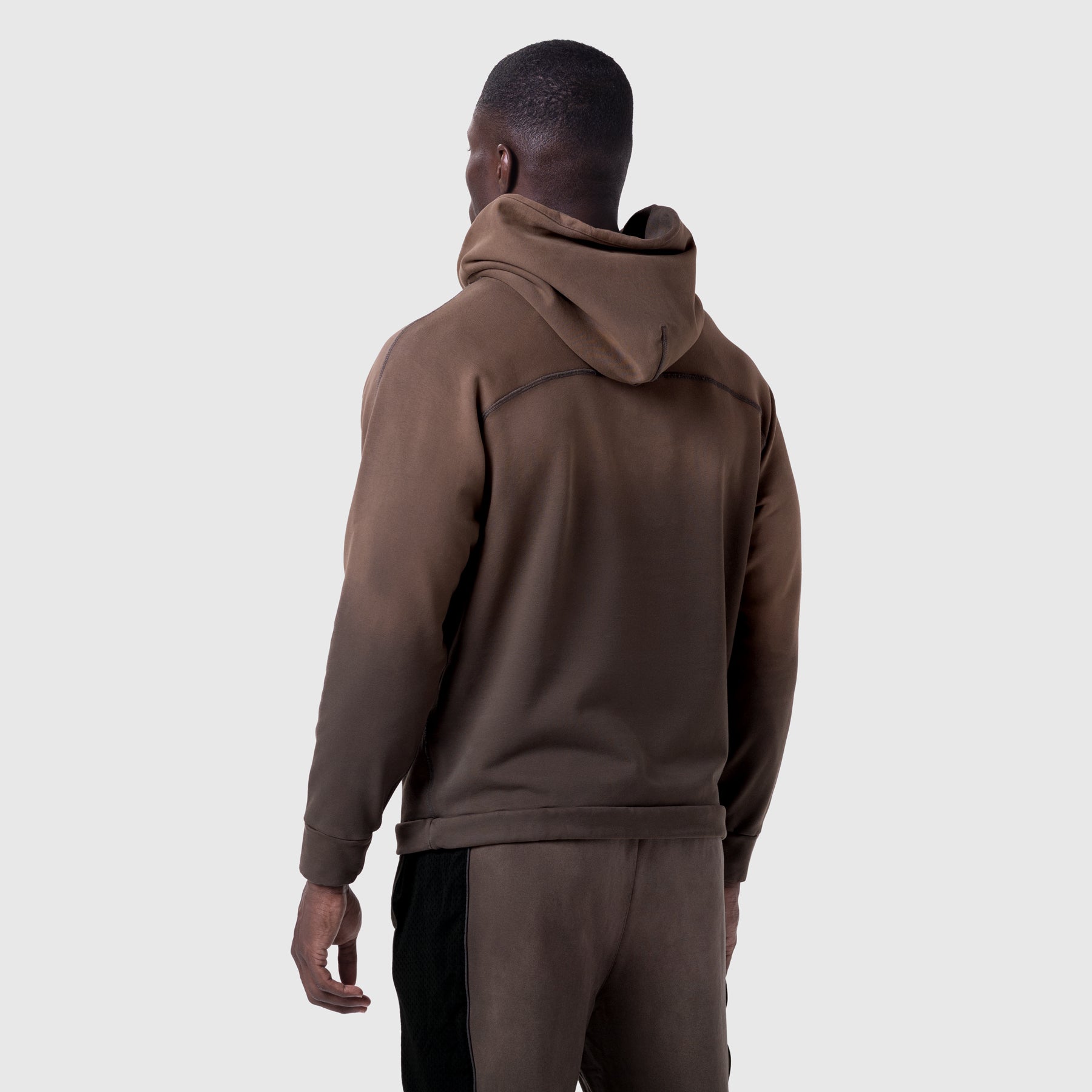 Tech-Terry Training Hoodie in dark earth, back view on model