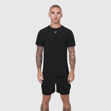 Black Laser-Vent Training Tee worn by model, front view, paired with black shorts