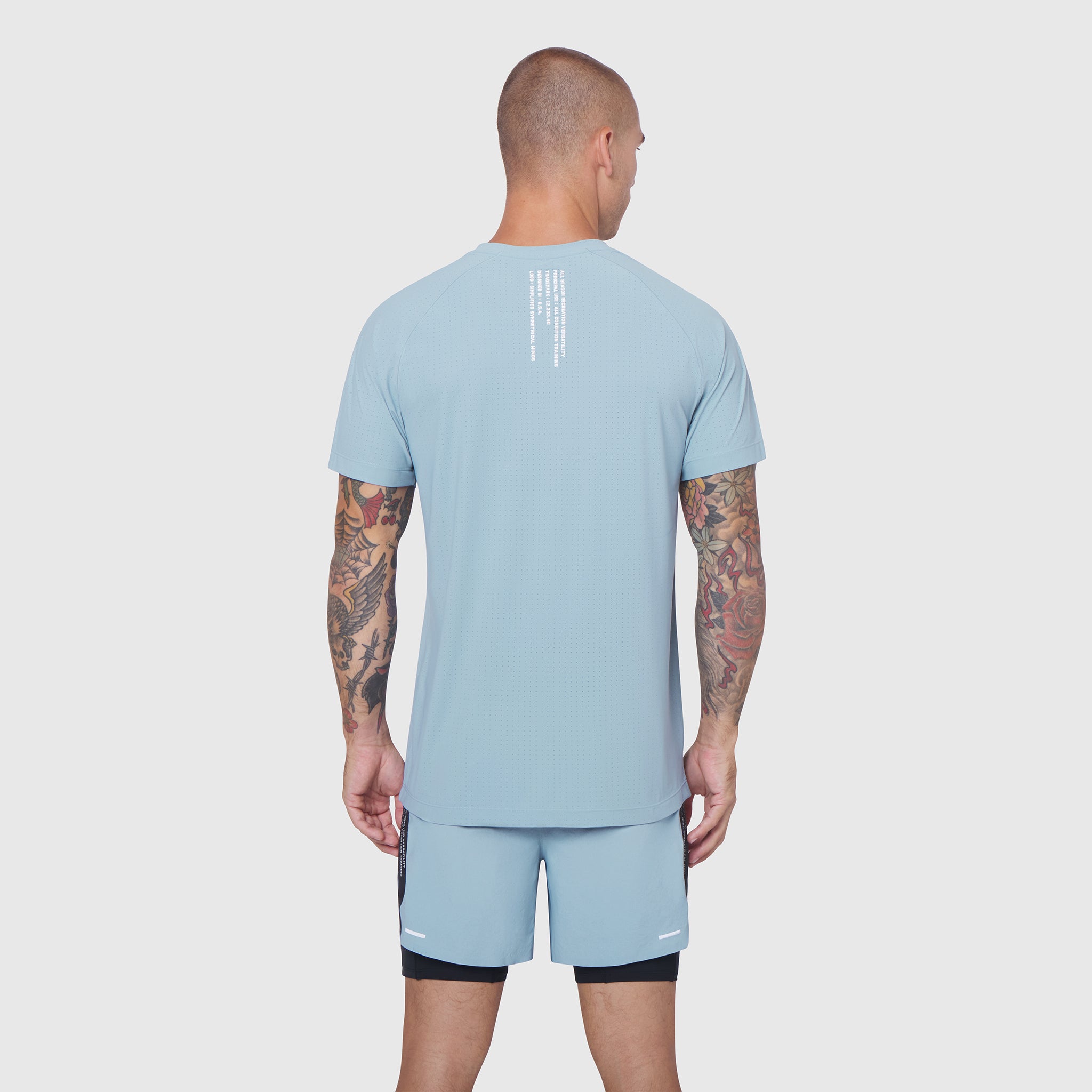 Light Sky Laser-Vent Training Tee worn by model, back view